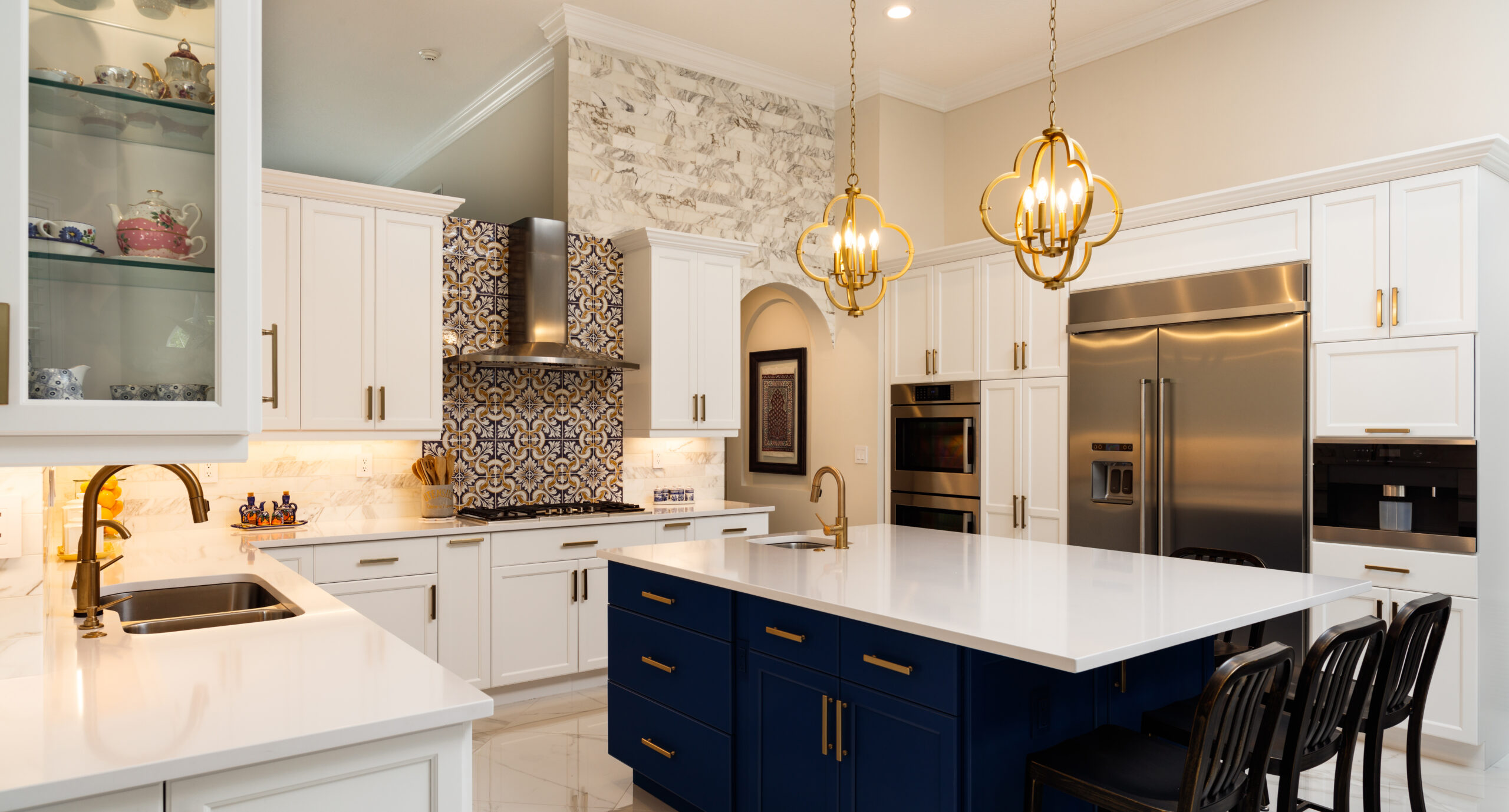 Beautiful luxury home kitchen with white cabinets. Exploring Creative Backsplash Ideas